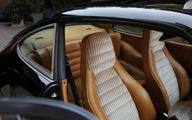 Clean Brown Back Seat Of Modern Car. Close-up Of Backseat Car With